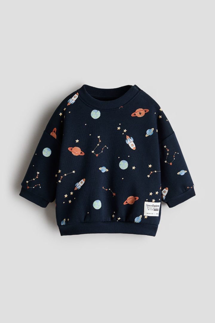 Suéter estampado con motivos del espacio. — Cocoa & Bambú